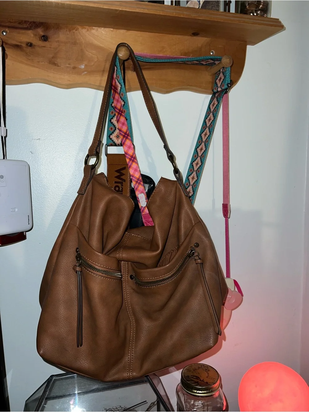 Stylish Brown Leather Shoulder Bag with Patterned Straps